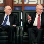 Berkshire Hathaway Chairman and CEO Warren Buffett, right, speaks alongside Vice Chairman Charlie Munger, Monday, May 4, 2015.  The annual Berkshire Hathaway shareholders meeting took place over the weekend in Omaha with over 40,000 in attendance.