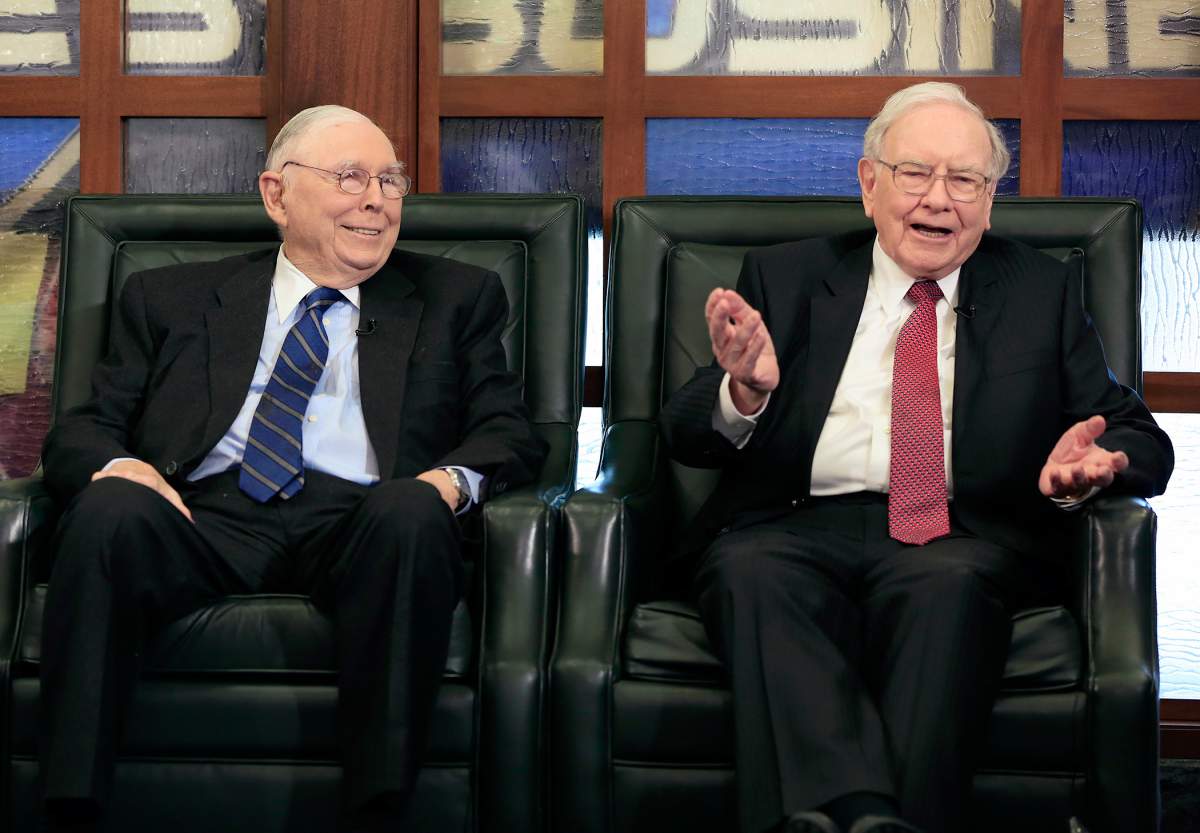 Berkshire Hathaway Chairman and CEO Warren Buffett, right, speaks alongside Vice Chairman Charlie Munger, Monday, May 4, 2015. The annual Berkshire Hathaway shareholders meeting took place over the weekend in Omaha with over 40,000 in attendance.